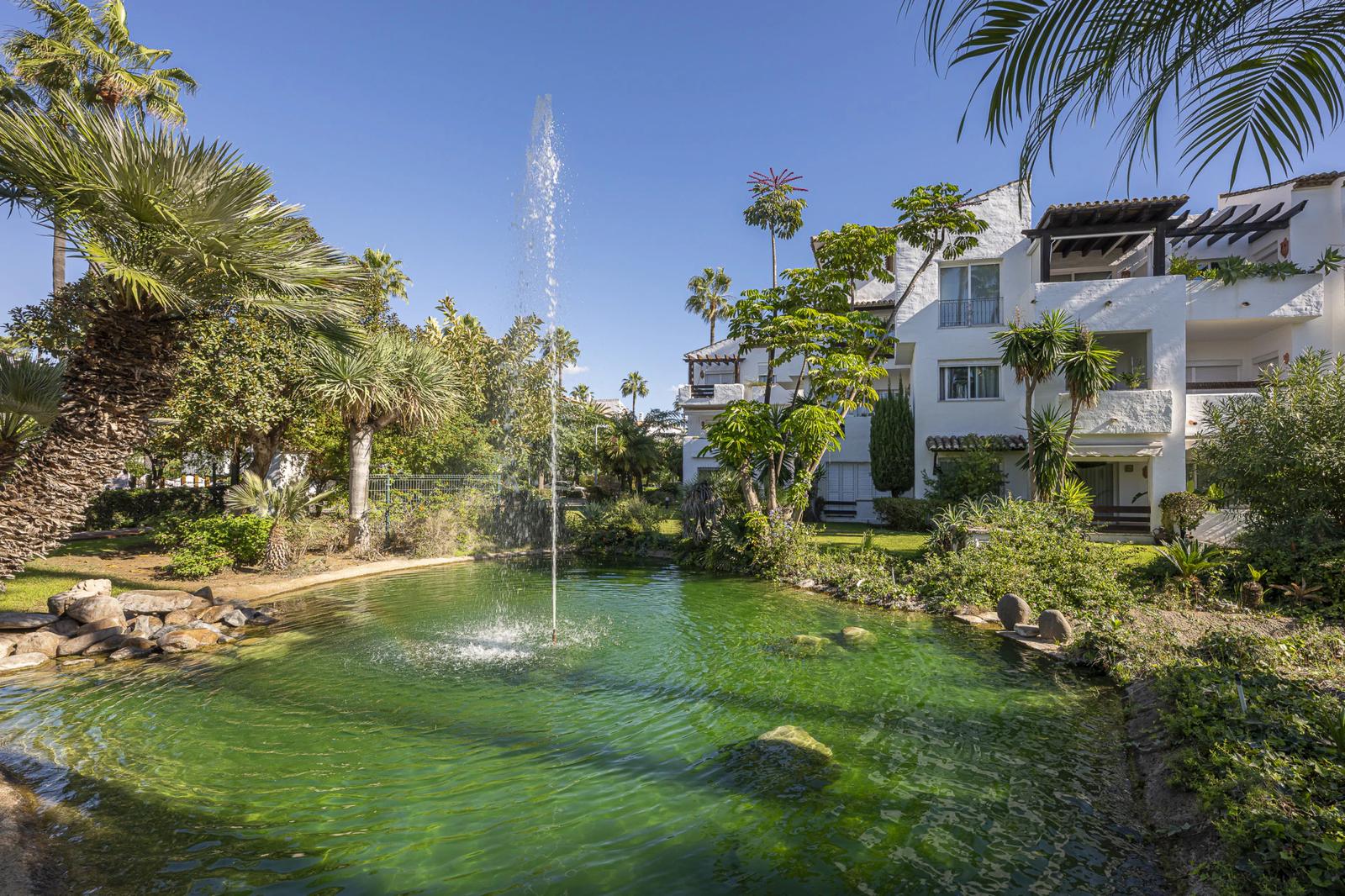 Beachfront Apartment with Private Garden · Photo 36